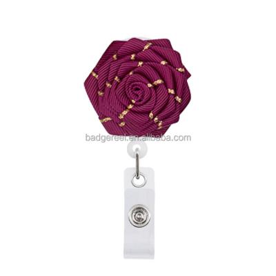 China Office lady flower custom logo and color retractable badge reel string badge reel yo-yo card holder retractable key reel for sale