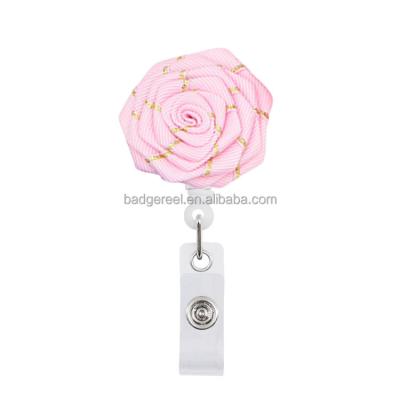 China Custom retractable string badge reel logo and color rose office flower badge reel yo-yo card holder soft retractable key reel for sale