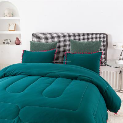 China Hot Selling Microfiber Fabric Comforter Amazon Hotel Bedding Pompom Comforter Bedding Set for sale