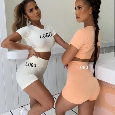 China 2 Piece Yoga Suit Breathable High Quality Logo Yoga Shorts Women Set Crop Sleeve Set Seamless Short Top Gym Fitness Active Wear for sale