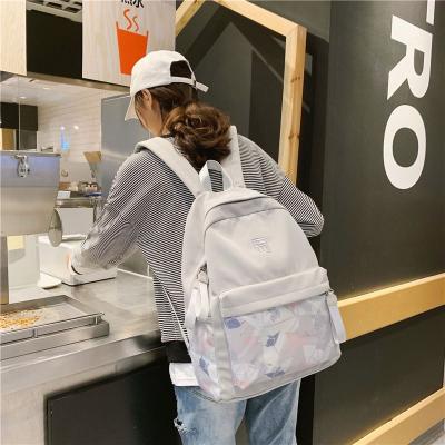 China Waterproof Custom Simple Women Travel Bag Girls Backpacks College Student Nylon Schoolbag Teenage Shoulder Bag for sale