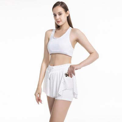 China Breathable Super Comfort Inner Striped Women Double Layer Running Workout Exercise Loose Shorts With Phone Pocket for sale