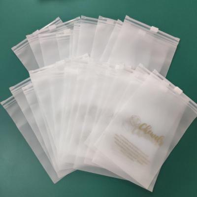 China Disposable resealable plastic bags for clothes garment packaging ziplock bag wholesale custom logo frosted plastic bag clothes zip lock for sale