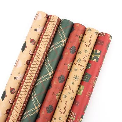 China Amazon Christmas Sale Wrapping Paper Custom Biodegradable Hot Rolls Paper Wholesale Christmas Gift Wrapping Paper for sale