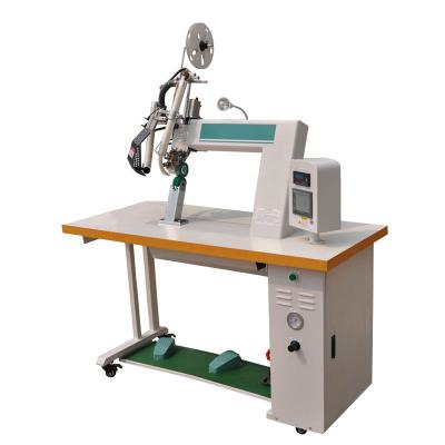 China Fabric hot air seam sealing machine for protective suit hot air seam sealing raincoat chemical tape machine for sale