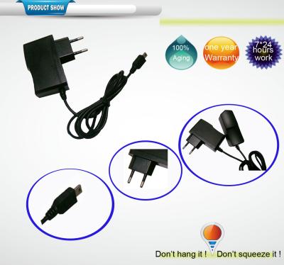 China Adaptador universal 5V 1.5A 2A da C.A. com micro/mini tomada da C.C. de USB à venda