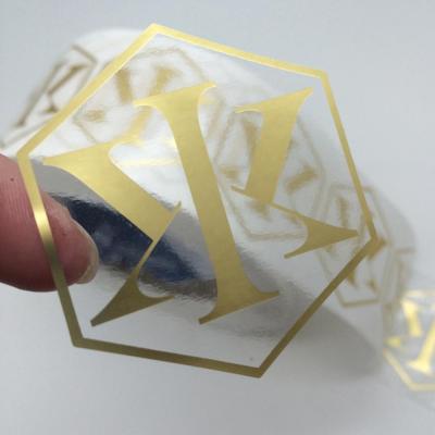 China Waterproof Self Adhesive Vinyl Die Cut Clear Transparent Packaging Custom LOGO Labels Stickers en venta