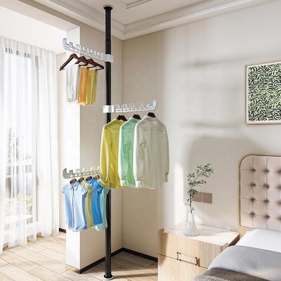 China No Drilling Factory Direct Bedroom Coat Clothes Drying Rack Hanger Telescopic Clothing Rod for sale