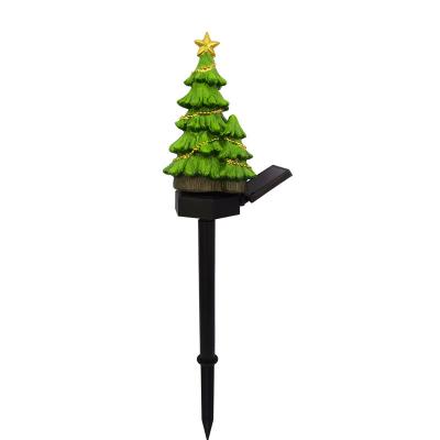 China Outdoor Garden LED Resin Christmas Tree Lights Solar Christmas Garden Lights for sale