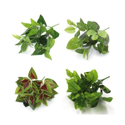 China Vivid Green Plastic Artificial Grass Plants Leaves Bush Artificial Greenery Tropical Leaves For Home Wedding Decoration Party Supplies for sale