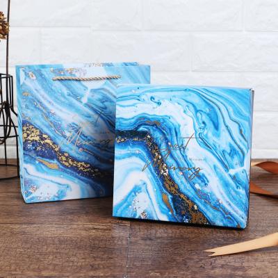 China Recycled Materials Candy Gift Packaging Paper Box With Hand Gift Box Set Wholesale Custom Marble Creative Gift Box for sale