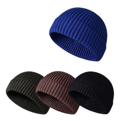 China JOINT New Design Lana Winter Logo Gorro Colorful Woven Label Knit Skull Beanie Cap for sale