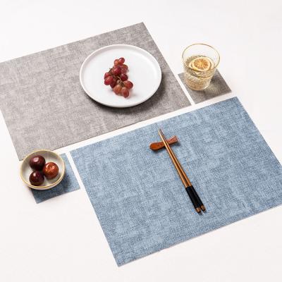 China Durable Heat Insulation PU Leather Heat Insulation Place Mat Nordic Single Fabric Pattern Waterproof Western Place Mat for sale