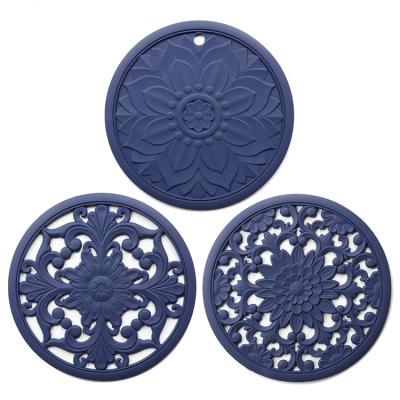 China Exquisite classic tabletop insulation silicone flower cavity high temperature anti-scalding protection pad for sale