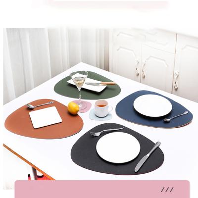 China Durable Double Sided Two Tone Drop Shape Leather Placemats Insulation Pad Anti-Slip Set for sale