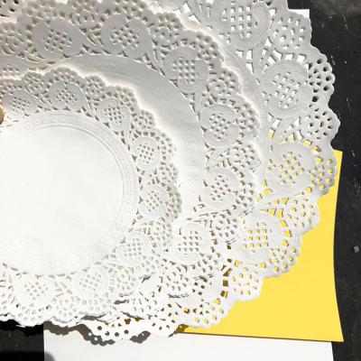 China Sustainable Hand Count Basing Material Lace Paper Cake Paper Lace Cushion for sale