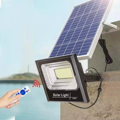 China Garden Ip65 Waterproof Portable Outdoor  Solar powered Flood Lights 25w 30w 45w 60w Warm White Solar Power Outdoor remote  Lamp for sale