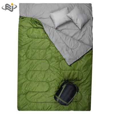 China Envelope Type Double Sleeping Bag With Pillow For Camping Or Hiking Cold Weather 2 Person Waterproof Sleeping Bag For Adult for sale