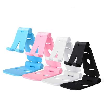 China 2021 New Arrival Desktop Mobile Phone Stand Tablet Metal Stand Foldable Plastic Ration Phone Holder Adjustable for sale