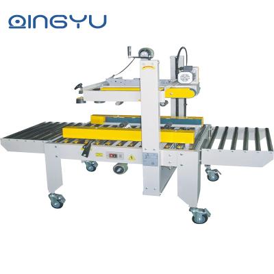 China Automatic Food High Efficiency Carton Folding Sealing Machine Up And Down Driven for sale