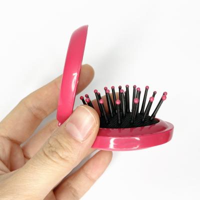 China Pocket Mirror Mini Oval Folding Hair Brush with Mirror, Compact Pocket Massager Comb, for Wet or Dry Hair for sale