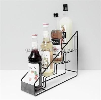 China Stocked Fabricate 4 Tier Black Metal Wire Syrup Bottle Display Stand for sale