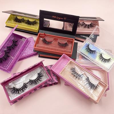 China Vegan Natural Faux Mink Lashes Own Brand Customized boxes wholesale 25mm full 3d strip Faux Mink Eyelashes for sale