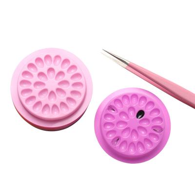 China Plastic Eyelash Extension Tools Glue Pad Pad Pad Eyelash Glue Holder For Eyelash Extensions Plastic Flower Shaped for sale