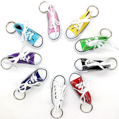 China Wholesale Cloth Novelty Gift 3 Thumb Chuck Sneaker Bulk Shoe Keychains for sale