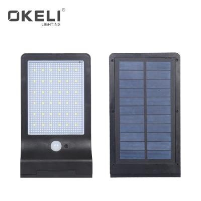 China Home Garden Motion Sensor LED Solar Powered Outdoor Wall Garden OKELI Solar Gate Light for sale