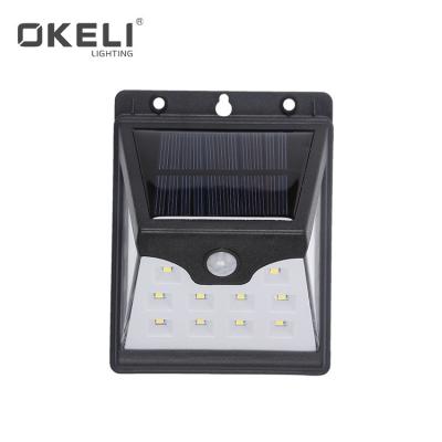 China High brightness 4w outdoor led solar wall mounted smd IP44 wall light from garden OKELI for sale