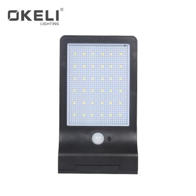 China OKELI Garden New Design 7w Home Led Motion Sensor Solar Light For Outdoor Emergency Security Solar Wall Light for sale