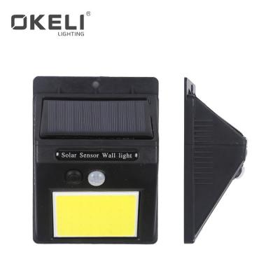 China ABS OKELI Solar Power 1W 2W Wall Lamp Door Decorate Motion Sensor Waterproof Outdoor Security Led Solar Wall Light for sale