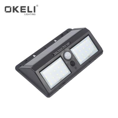 China Motion Sensor Waterproof Outdoor Garden Solar Panel ABS OKELI 40 LED SMD Solar Security Wall Light for sale