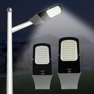 China Easy to Install/Intense Brightness OKELI IP66 30W 50W High Lumen Aluminum Die Casting Aluminum Waterproof Outdoor LED Street Light for sale