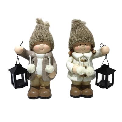 China Eco-friendly Indoor Ceramic Christmas Ornaments Boy Girl Fashion Home Decoration for sale