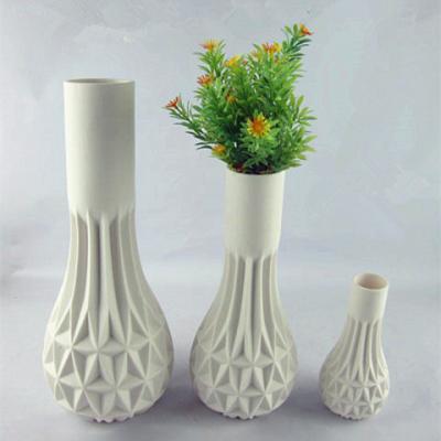 China Wholesale Chinese Eco-friendly Elegant Ivory Matte Color Matte Ivory Flower Vase Porcelain Indoor Flower Vase for sale