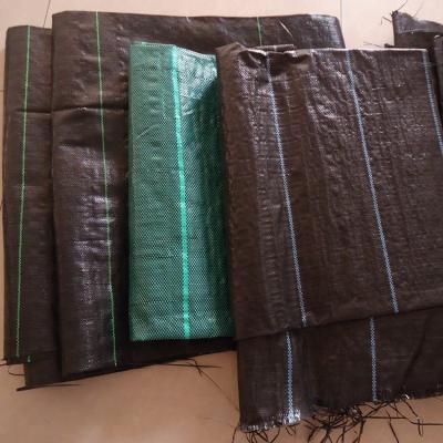 China Geotextile Polypropylene (PP) Split Weed Control Film Woven Ground Cover Membrane Landscape Fabric for sale