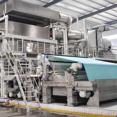 China Full Automatic Corrugated Kitchen Towel And Toilet Paper Tissue Paper Roll Making Machine Toilet Paper Making Machine for sale