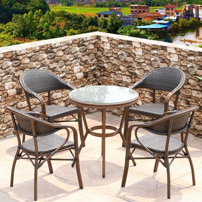 China Traditional Outdoor Tables and Chairs with Umbrellas Courtyard Balcony Garden Terrace Outdoor Leisure Rattan Cafe Table and Chair 5 - for sale