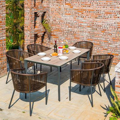 China Minimalist fashion garden wicker chair table setoutdoor dining table outdoor setting se for sale