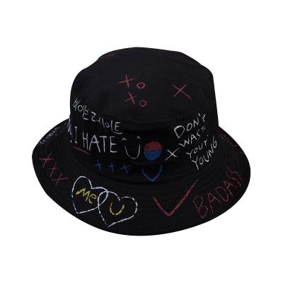 China New Graffiti Picture Bucket Hats Women Men Hip Hop Harajuku Bucket Hat Women's Fashion Cotton Flat Casual Fisherman Hat Black White for sale