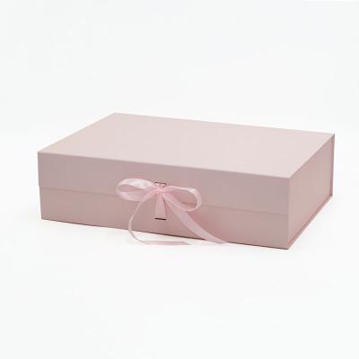 China Recyclable Bulk Luxury Folding Flat Pack Magnet Lid Rose Gift Box Packaging For Women's Clothing for sale