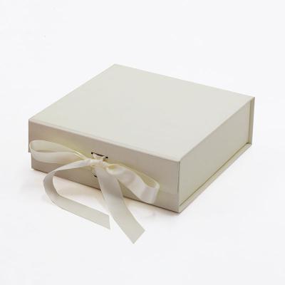 China Small Recyclable Bulk Luxury Ivory Jewelry Accessories Gift Packaging Box With Ribbon for sale