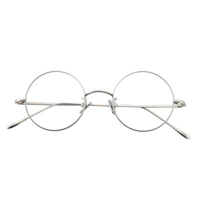 China Popular men and unisex wholesale women round glasses metal frames gold and silver optical frames for sale