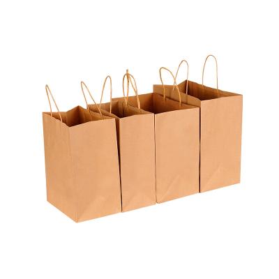 China Recyclable Custom Logo Heavy Duty Kraft Paper Shopping Bag Gift Bag With Handle For Food Packaging Shopping Party for sale