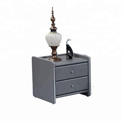 China Modern bedroom furniture faux leather modern nightstand bedside table zu verkaufen