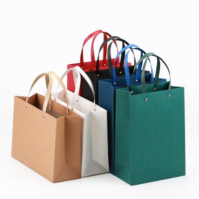 China Recyclable Wholesale Custom Paper Bag With Logo Printed Black Luxury Gift Wrapping Paper Shopping Bag With Handle for sale