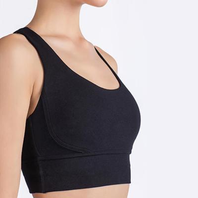 China Wholesale Breathable Women Sports Bra Sports Wear Seamless Lift Up Padded Fitness Top Yoga Solid Color Bra for sale