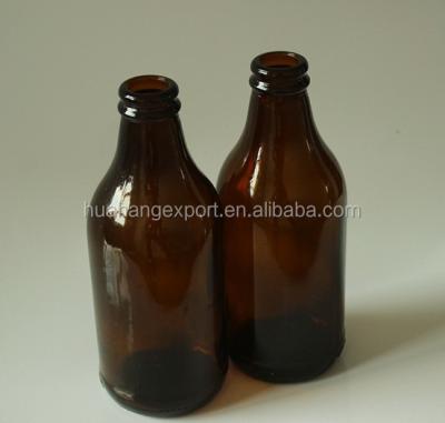 China Beverage factory wholesale 8oz stubby beer bottle with gold crown cap for sale